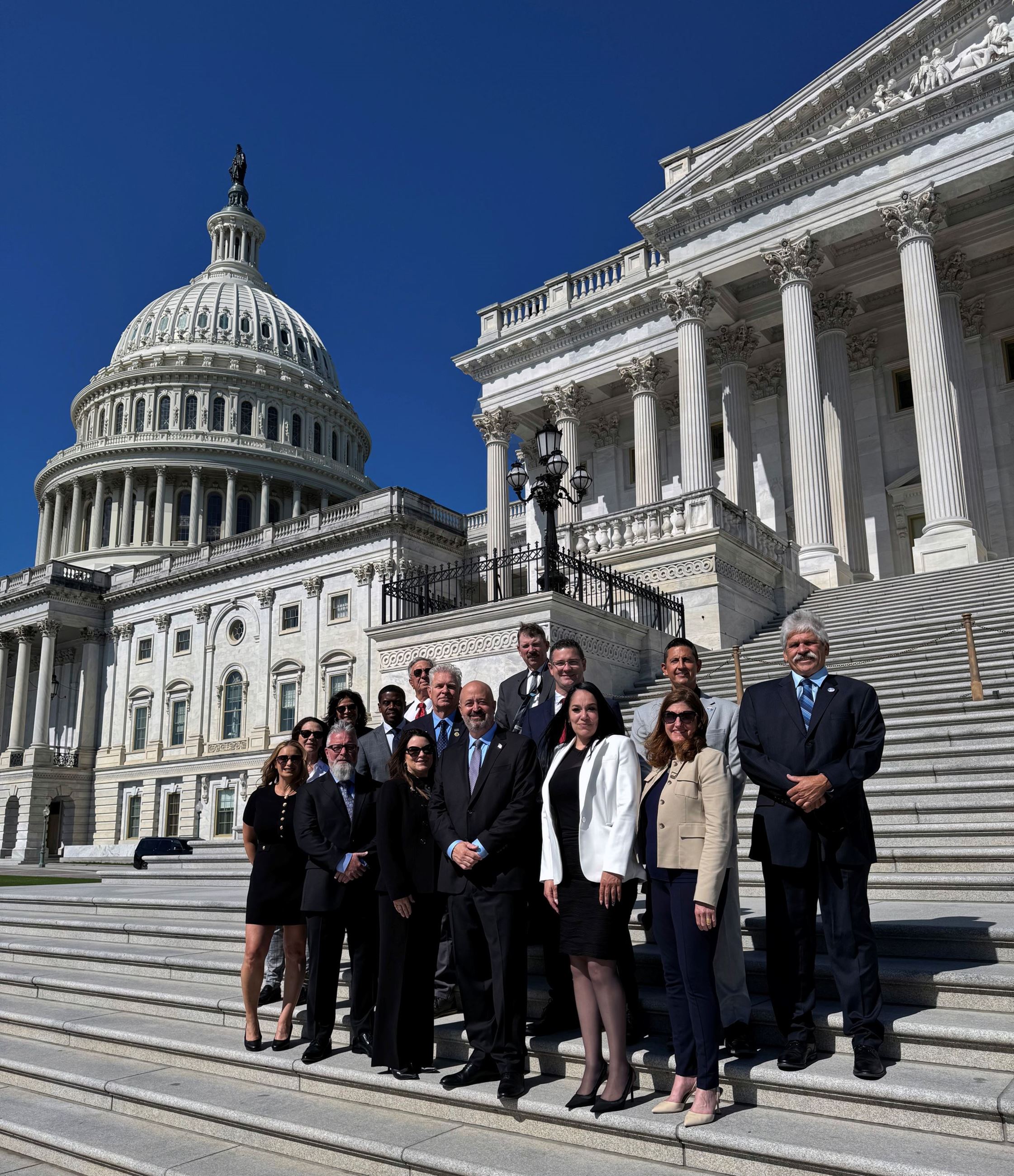 Some of the San Joaquin One Voice delegation on steps of U.S. Capitol.